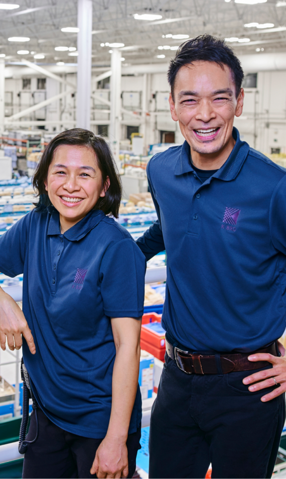 K-Bro staff members overlooking the production floor